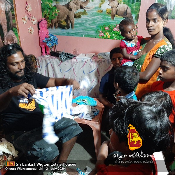 Distributing Clothes to the Children of Wigton Estate